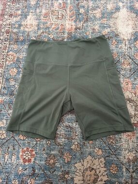 Danskin green biker short with pockets size Medium